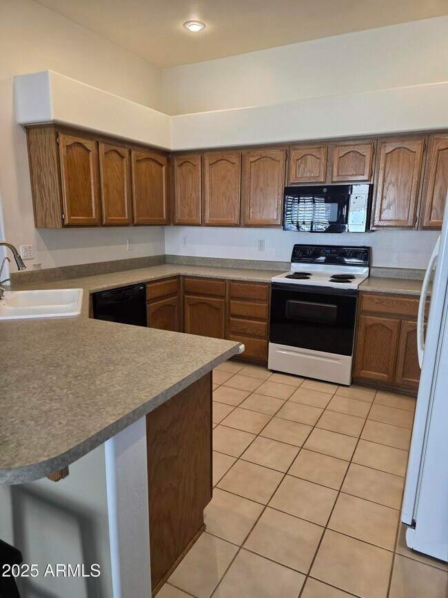 Building Photo - 4614 N Desert Stream Way