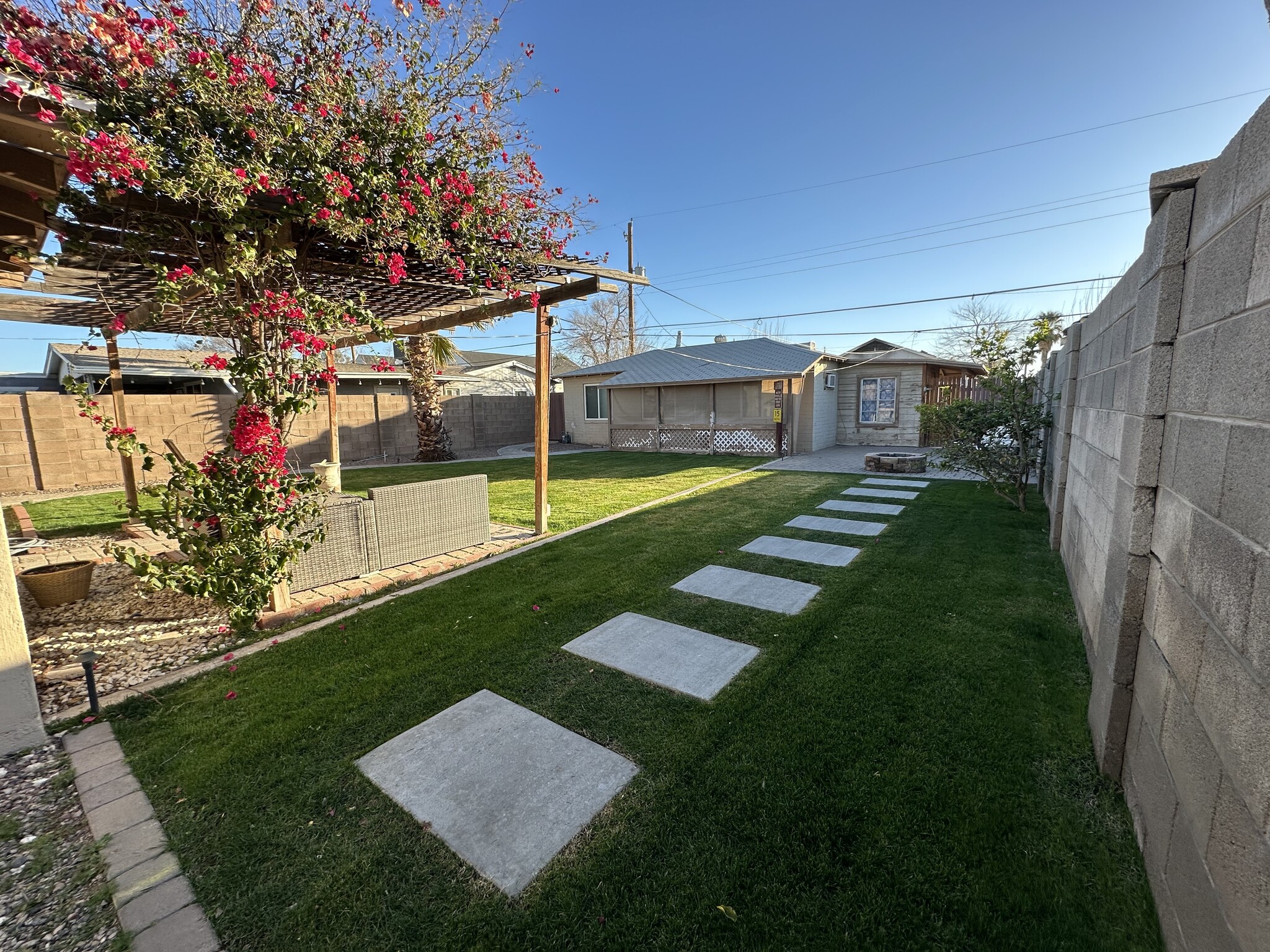Stepping stones back to Patio 2 from Patio 1 and side yard (gravel with an RV gate) - 2513 N 28th St