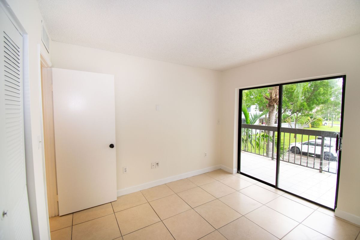 Building Photo - 13255 SW 88th, 201-CS