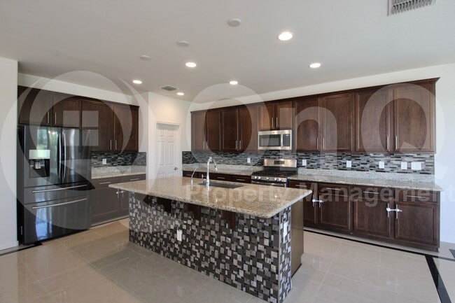 Building Photo - 10169 W Los Gatos Dr