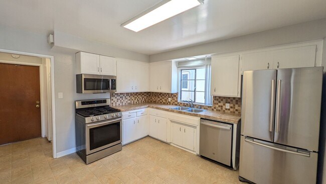 Building Photo - Available in July - New flooring and paint