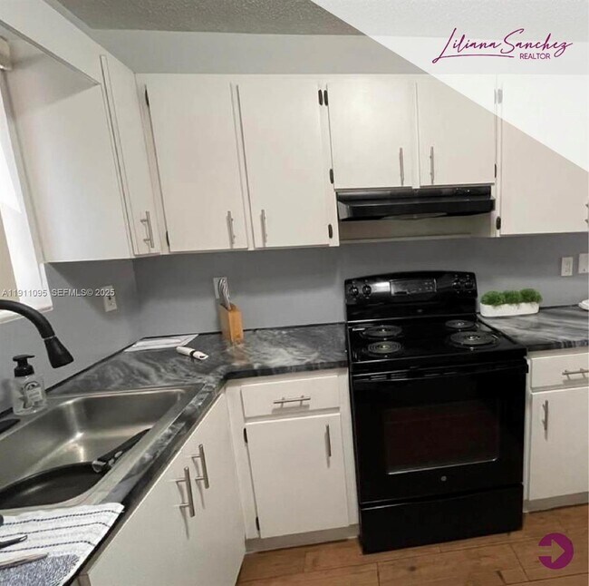 Building Photo - 7755 W 30th Ct