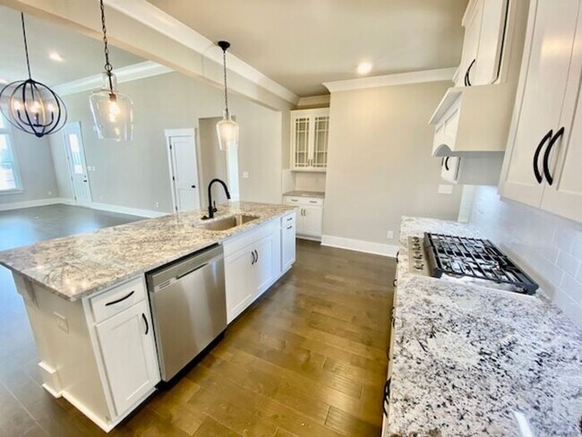 Building Photo - Clift Farm townhome with a fence and 3 car garage