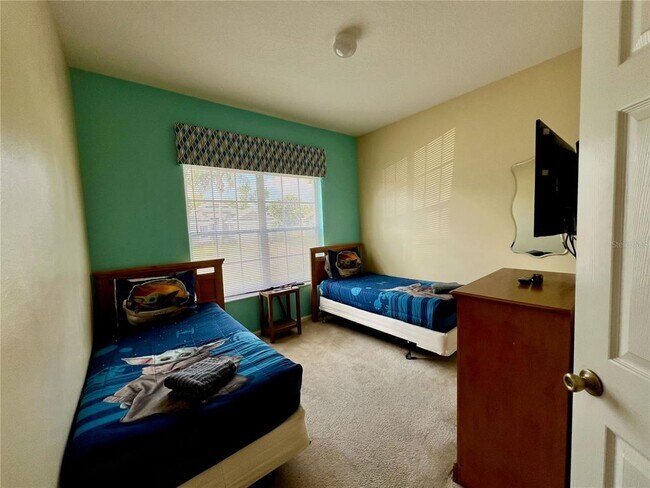 Building Photo - 8127 Fan Palm Way