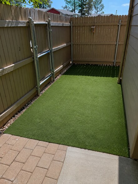 Back patio with turf - 3200 S Litzler Dr