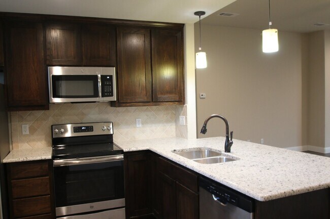 Building Photo - 1309-1313 White Sand Dr.