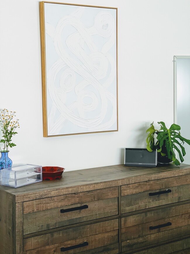 Minimalistic Bedroom decor with bluetooth speaker - 1907 Malcolm Ave