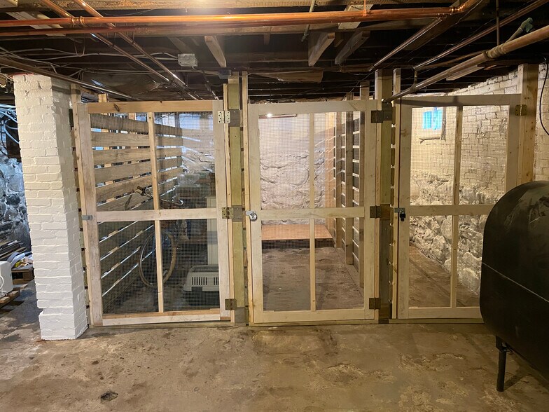 18 North basement storage cages. - 18 North St