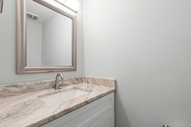 Building Photo - Rare Find: Updated and Modern End-Unit Tow...
