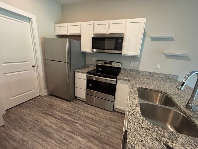 Building Photo - Spacious 3BR Home with Granite Kitchen & Covered Patio Near 53rd & Meridian