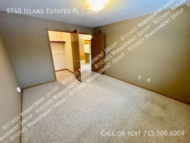 Building Photo - 9748 Island Estates Pl
