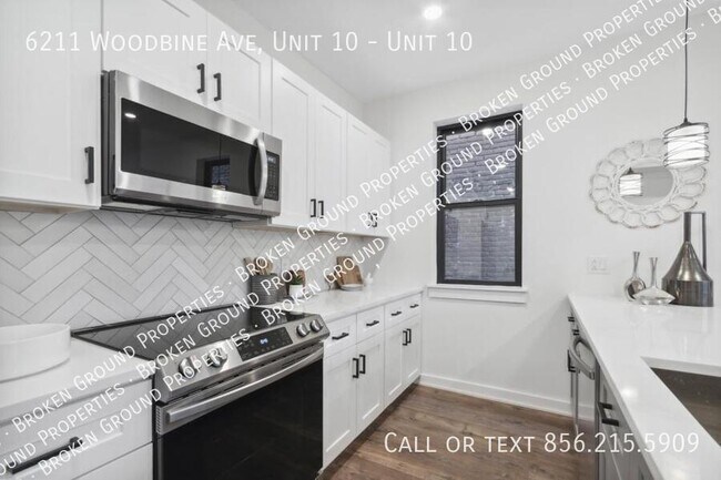 Building Photo - 6211 Woodbine Ave