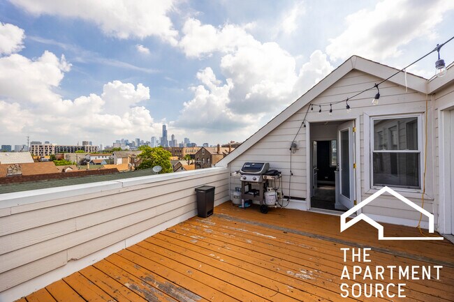 Building Photo - 1657 S Throop St