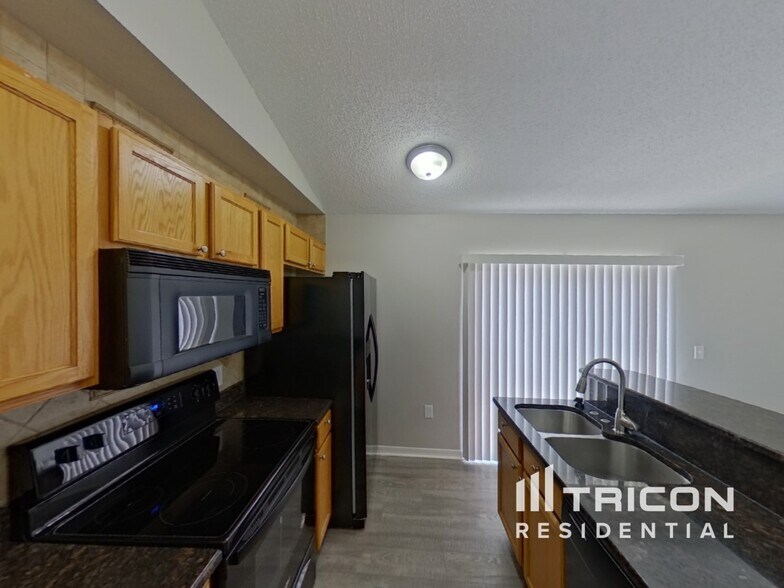 Building Photo - 6406 Tabogi Trail