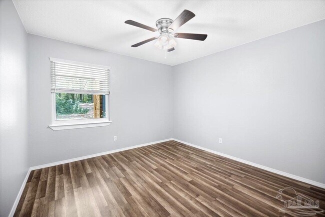 Building Photo - 6587 Bass Ln