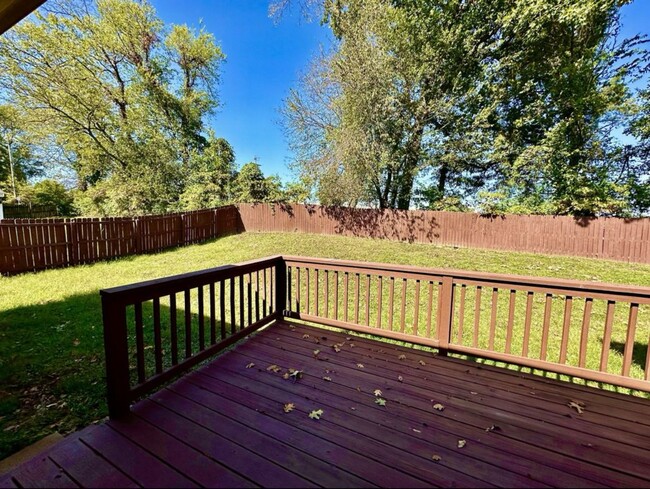 Building Photo - Three Bedroom with fenced-in backyard