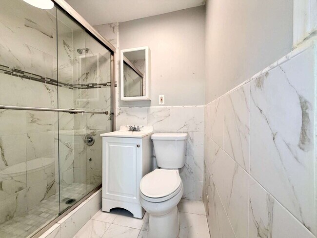 Building Photo - Spacious 1BR w/ Bonus Room Open Layout • Assigned Parking • Appliances • Garfield