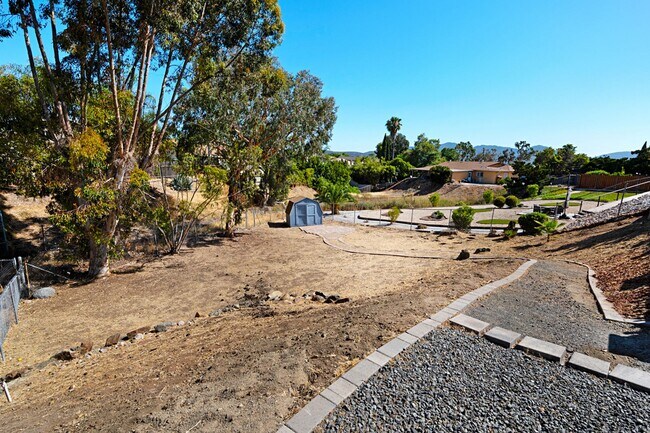 Building Photo - Beautiful 3BD 2BA House Sitting on Over 1/...