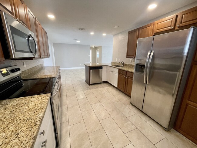 Building Photo - 4 bedroom 2 bathroom pool home for rent