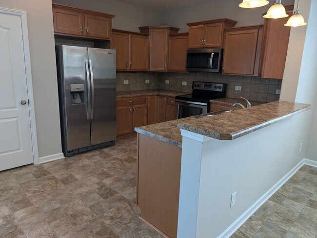 Building Photo - Pristine, move in ready Home located in th...