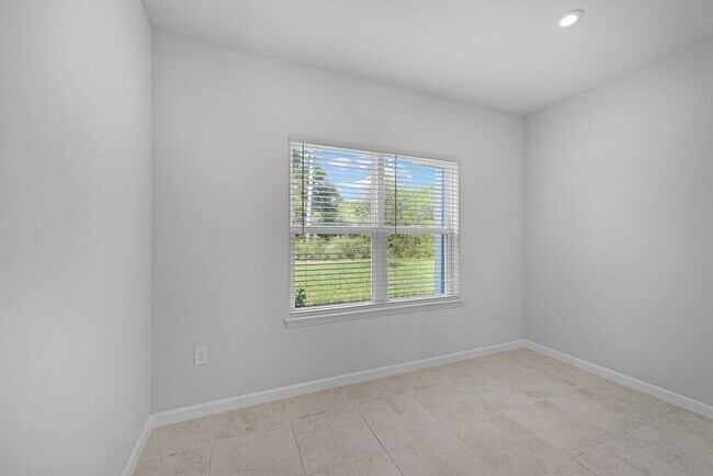 Building Photo - Brand-New 4BR Home with Tile Floors & Quar...