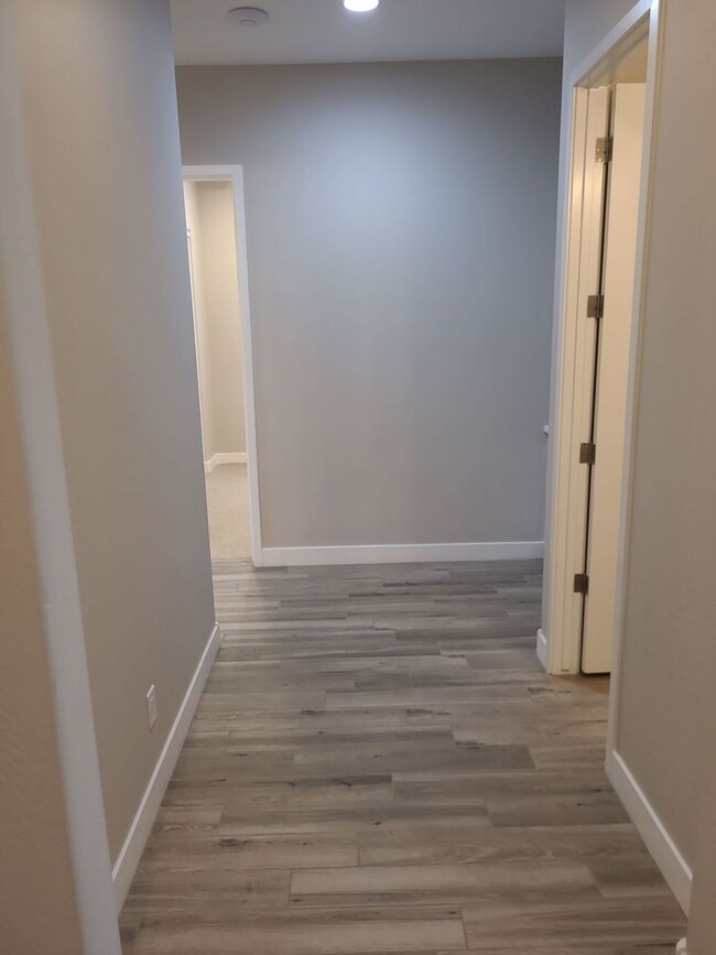 Building Photo - Pristine Luxury Rental: Stunning 4-Bed, 2....