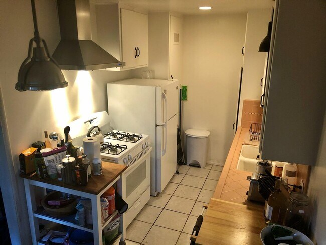 Kitchen w stanless hood - 4925 Cahuenga Blvd