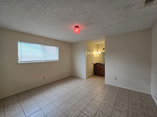 Building Photo - NEW IN MANAGEMENT - AVAILABLE NOW!