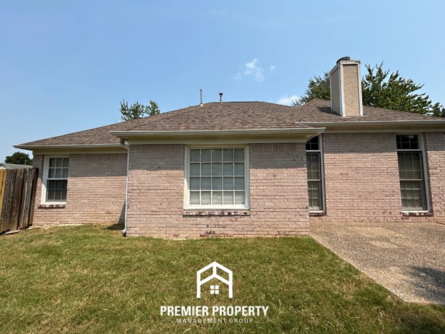 Building Photo - Spacious 3BR/2BA Near Southwind | 1,958 Sq Ft, Brick Fireplace, 2-Car Garage & Quiet Cove