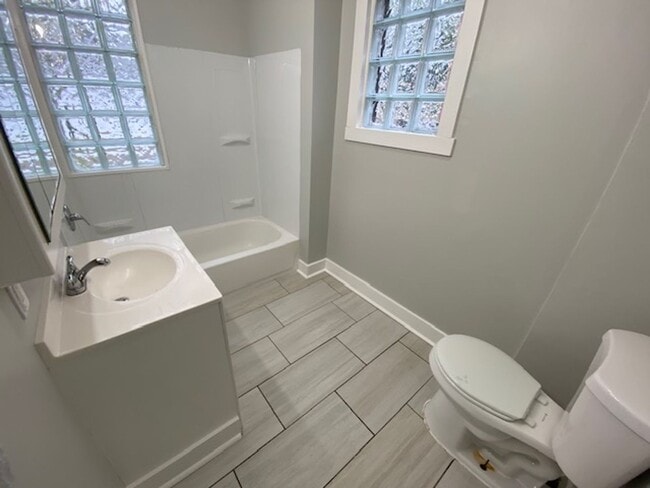 Building Photo - Updated 5-Bed, 2-Bath with Attic Suite & Clean Basement