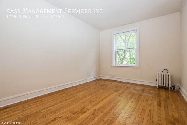 Building Photo - 1735 W Pratt Blvd