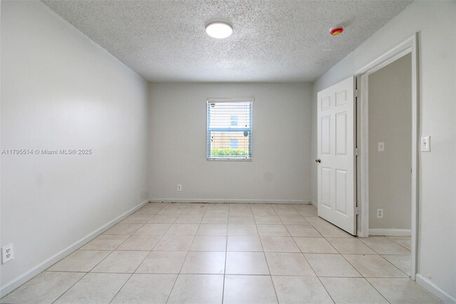 Building Photo - 2451 NW 56th Ave