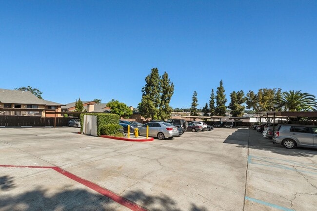 Building Photo - 2 Bedroom 1.5 Bath Townhome with  pvt patio (AC/Pool/Gated Parking/EV Chargers)