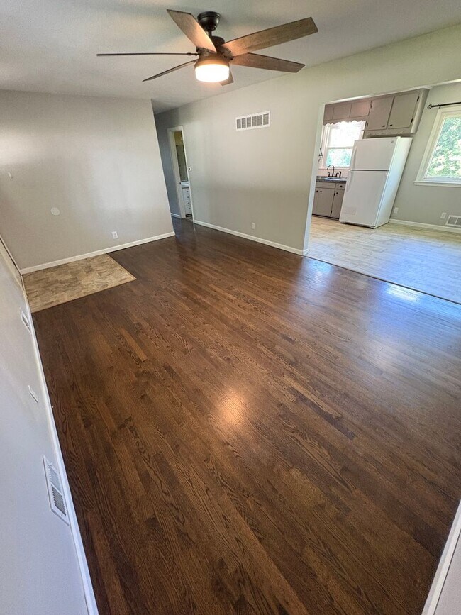 Building Photo - Spacious 4 Bed / 2.5 Bath Home on Nearly 3/4 Acre Lot with Walkout Basement and Multiple Living A...