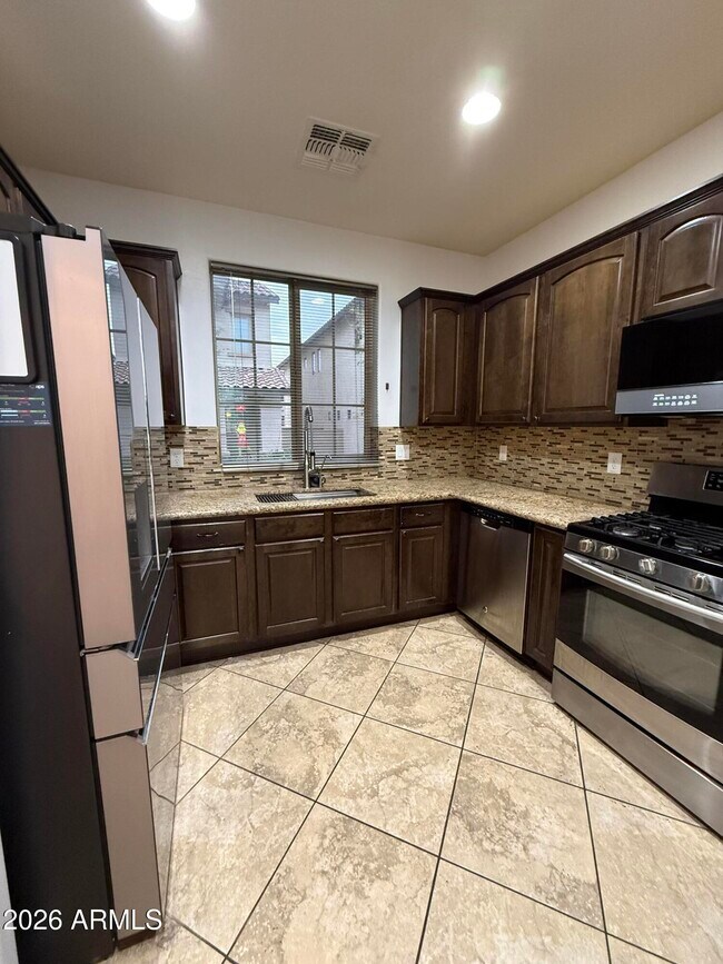 Building Photo - 9242 W Meadow Dr