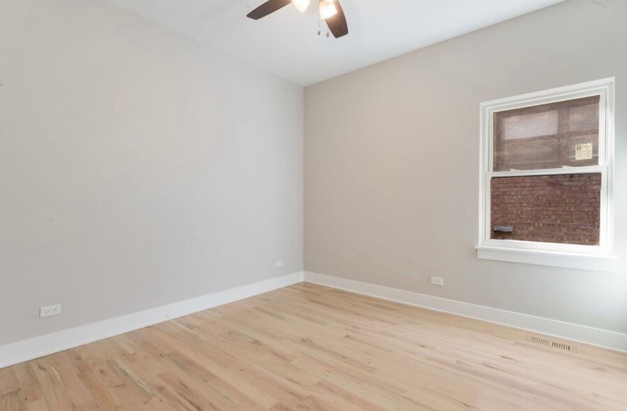Building Photo - 6404 S Vernon Ave