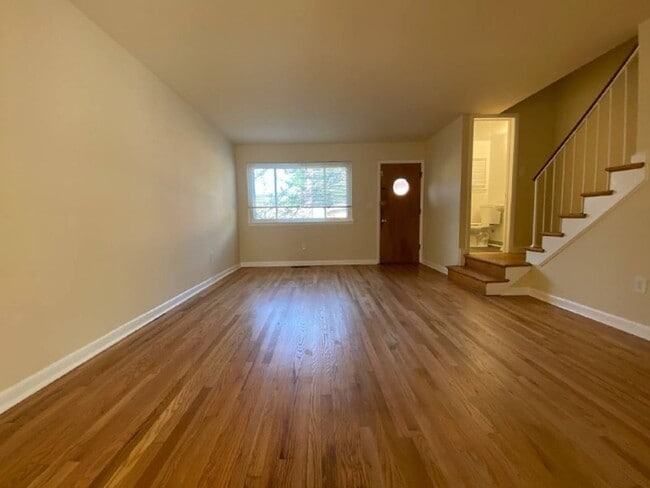 Building Photo - A spacious two bedroom, one and one half bath condo townhouse located in the northern section of ...