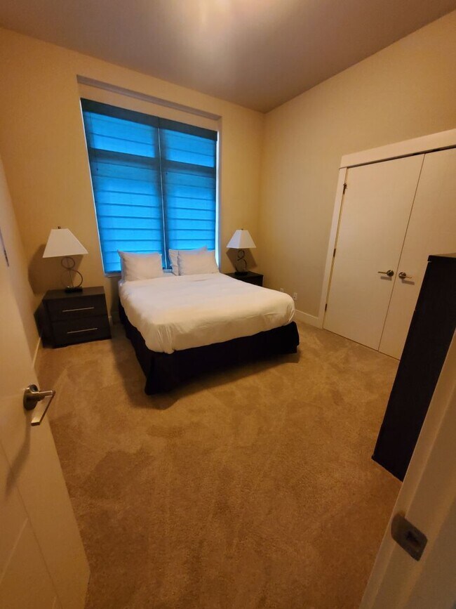 Building Photo - Spacious, Modern Living full of luxurious details!