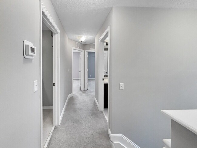 Building Photo - Spacious 3BR Townhome in Gated Villa Palma | Garage | Community Pool