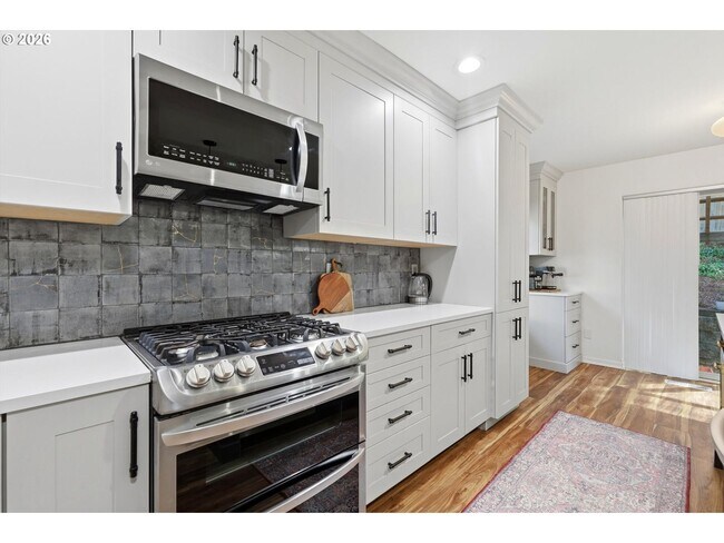 Building Photo - Beautifully Updated 5BR Home with Designer Kitchen, Main-Level Suite & Private Backyard Oasis Nea...