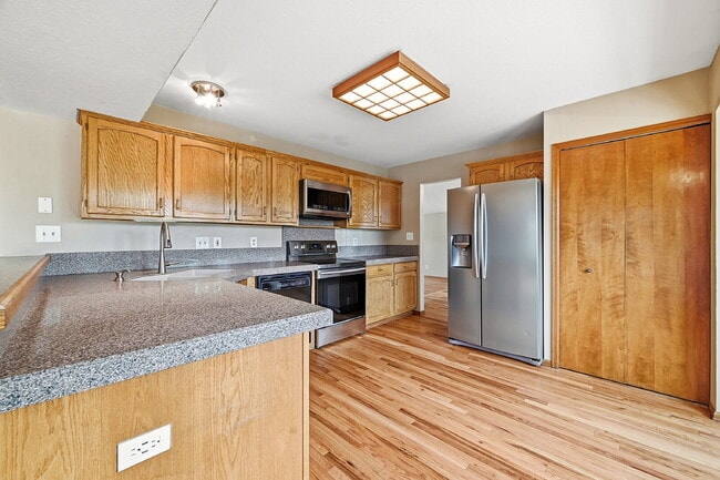 Building Photo - $2,845.95- 4-Bed /3-Bath Gem with Finished Basement and Fenced-in Yard in Colorado Springs!