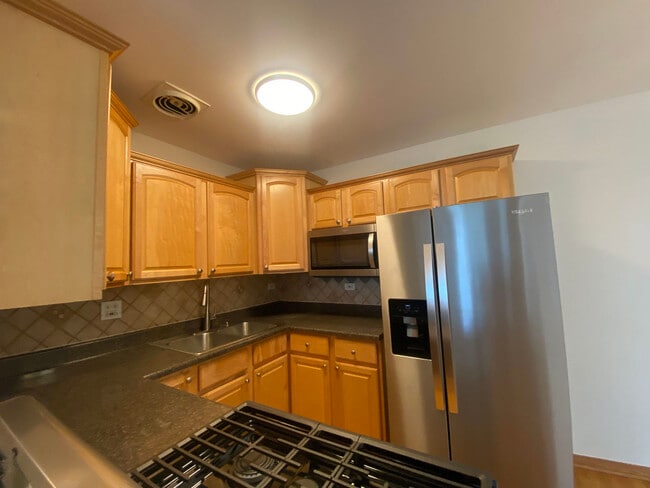 Building Photo - 4600 N Cumberland Ave