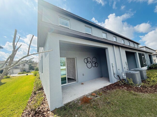 Building Photo - Townhouse in Land O' Lakes - The Townes at Lake Thomas