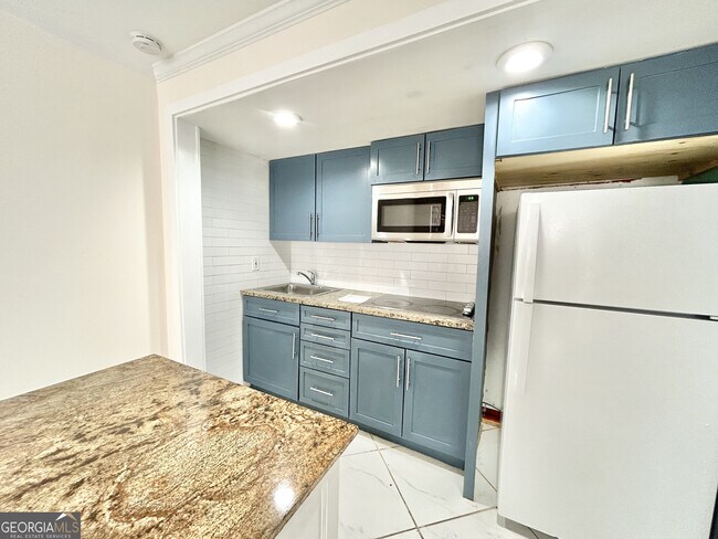 Building Photo - 6031 Ambassador Dr