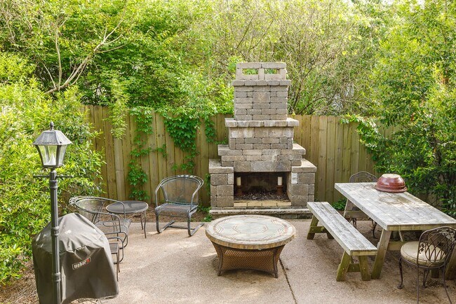 Building Photo - Beautiful Sylvan Park Home with Screened Porch & Outdoor Stone Fireplace