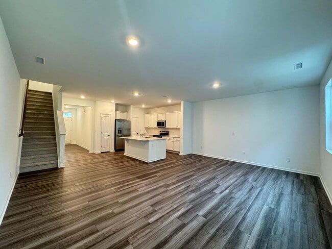 Building Photo - BRAND NEW GORGEOUS TOWNHOUSE in a very con...