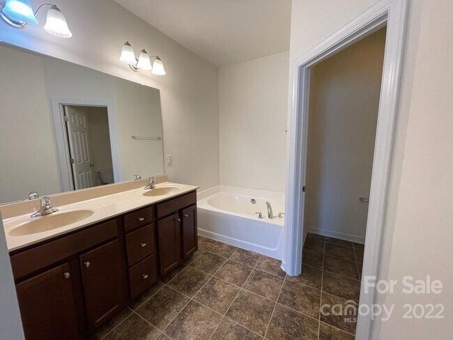 Building Photo - Short Term Rental Coming Soon! 3 BR/2.5BA | Renovated Townhome | 2-Car Garage Parking |Neighborho...
