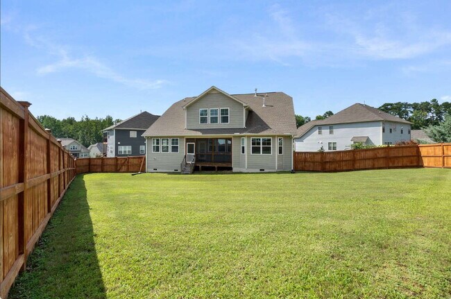 Building Photo - Luxurious 4-Bedroom Retreat with Third Floor Bonus Room & Fenced-in Backyard