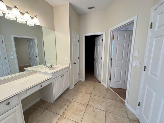 Building Photo - Spacious 4-Bedroom Home with Private Pool and Modern Comforts