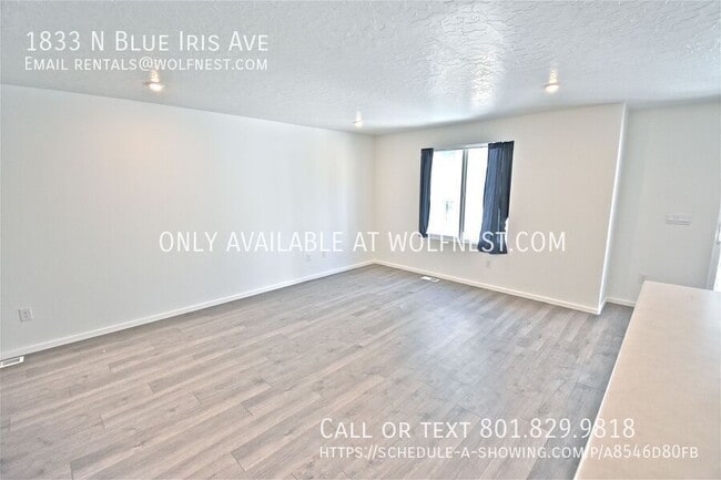 Building Photo - 1833 N Blue Iris Ave